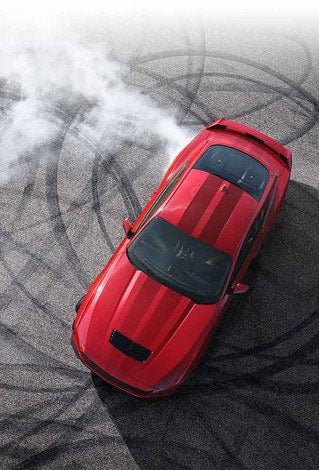 Overhead view of a 2024 Ford Mustang® model with tire tracks on pavement | Cecil Atkission Ford Hondo in Hondo TX